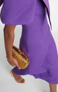 Rebecca Vallance's Rumi one-shoulder midi dress is the ultimate cocktail attire in a striking purple hue. Made to a figure-hugging fit from textured crêpe, it features a puff sleeve adorned with a label-signature taffeta bow.  RRP £485  try it. rent it. love it.  xoxo   
